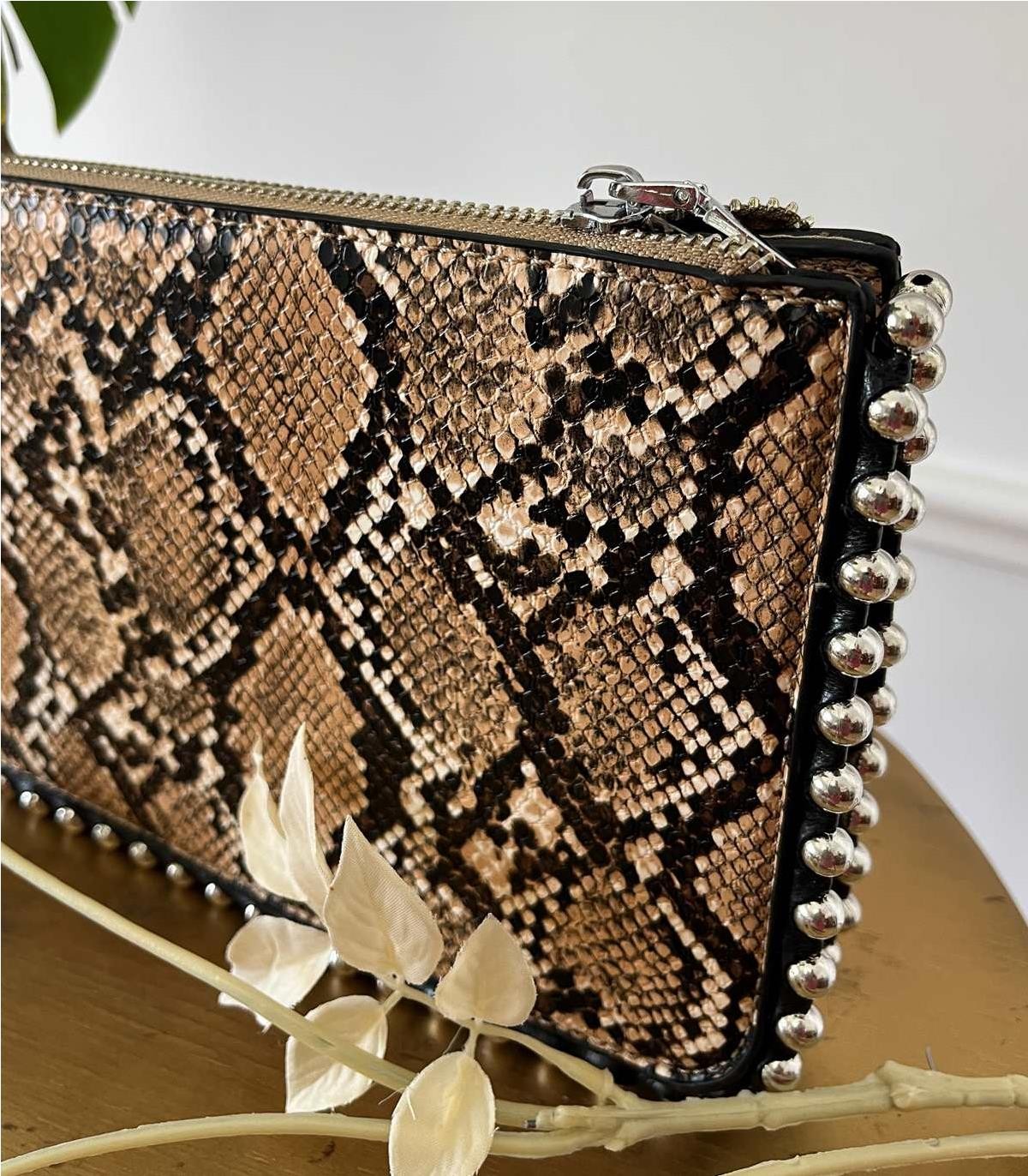 CARTERA ANIMAL PRINT